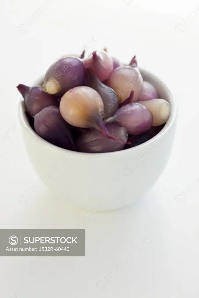 Bowl of Organic Red Baby Onions