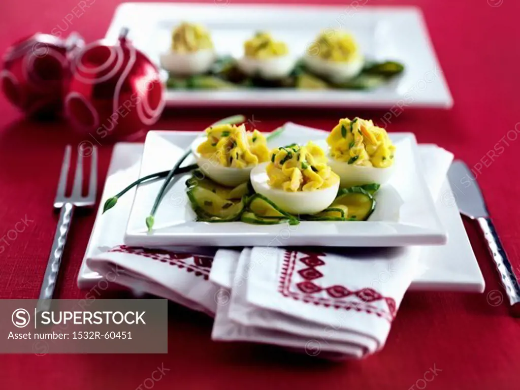 Devilled eggs on cucumber slices