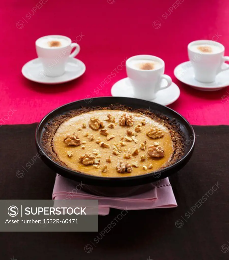 Sweet potato-cheese cake and three cups of cappuccino