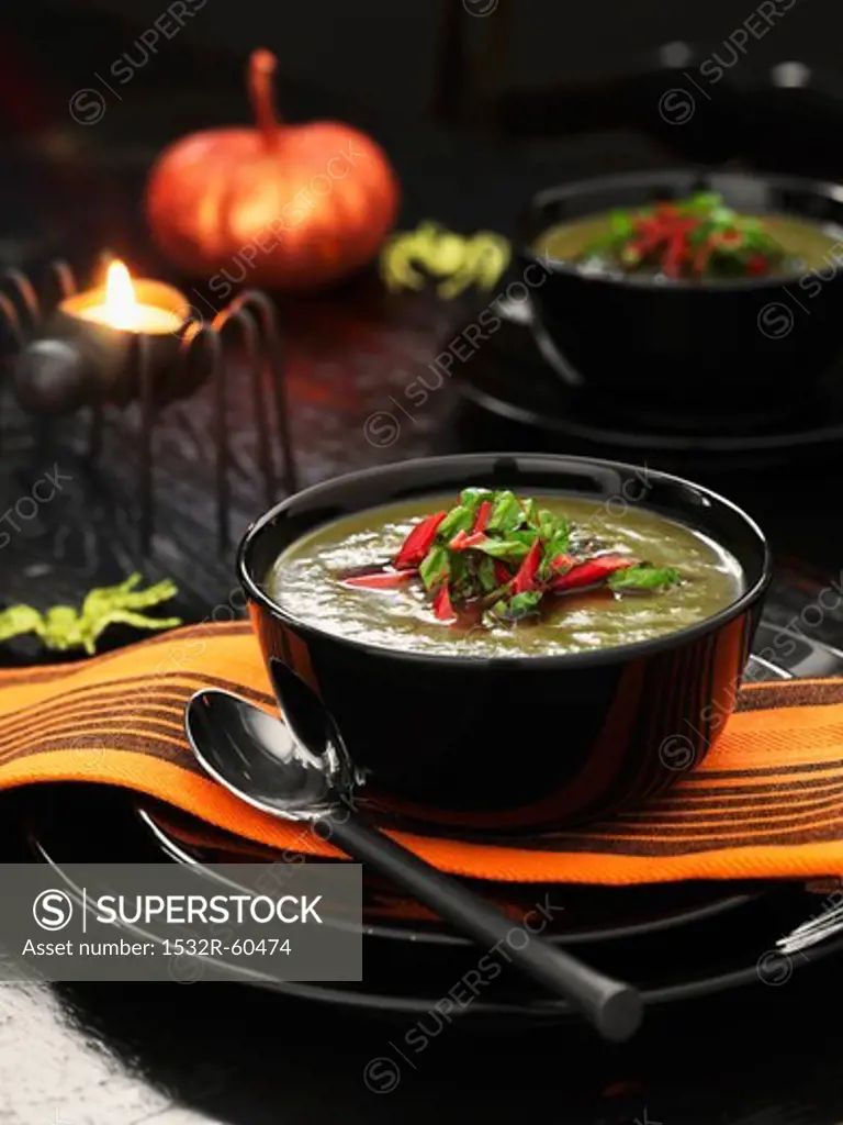Green cream of vegetable soup at Halloween