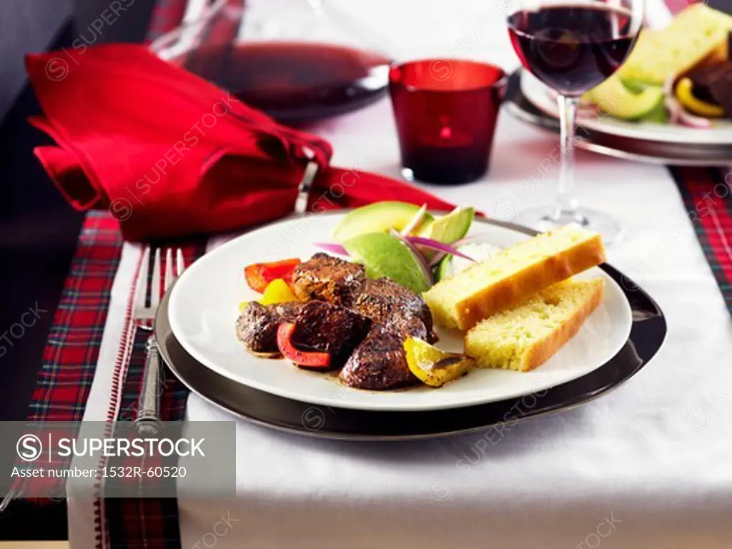 Slice sirloin steak with avocado and bread for Christmas