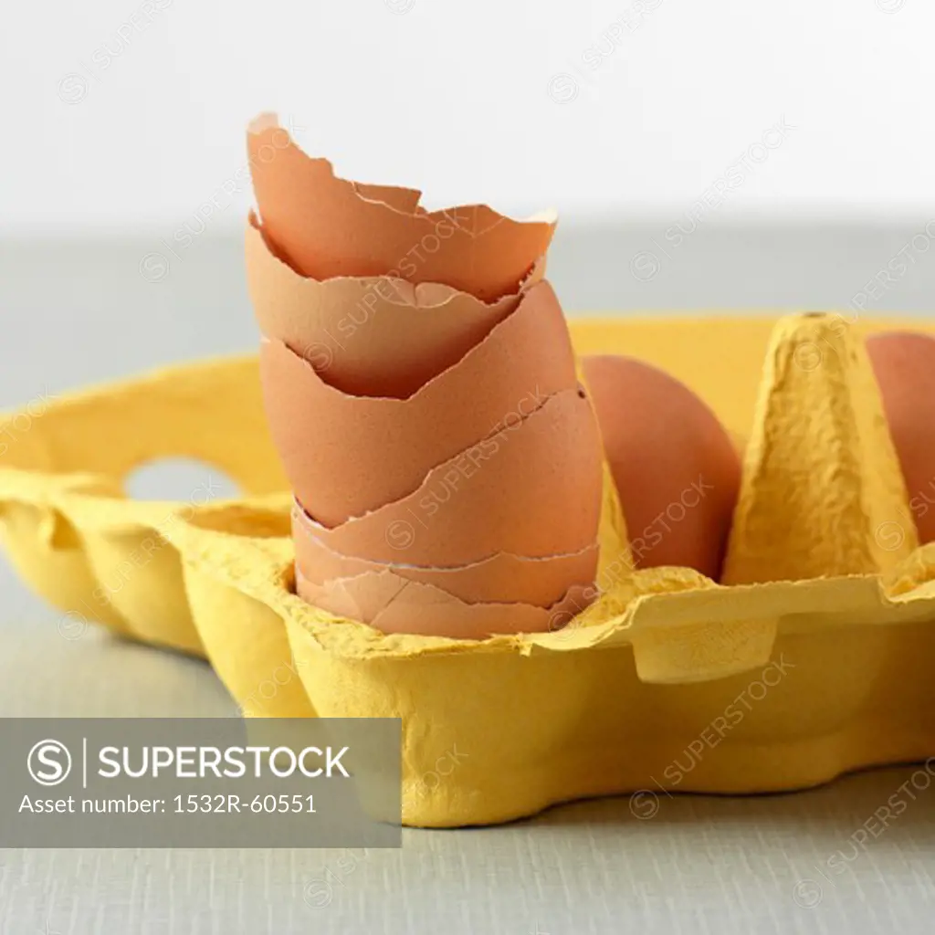 Stacked chicken eggs in an egg box