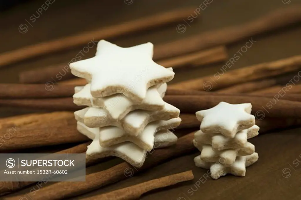 Stacked cinnamon stars on cinnamon sticks