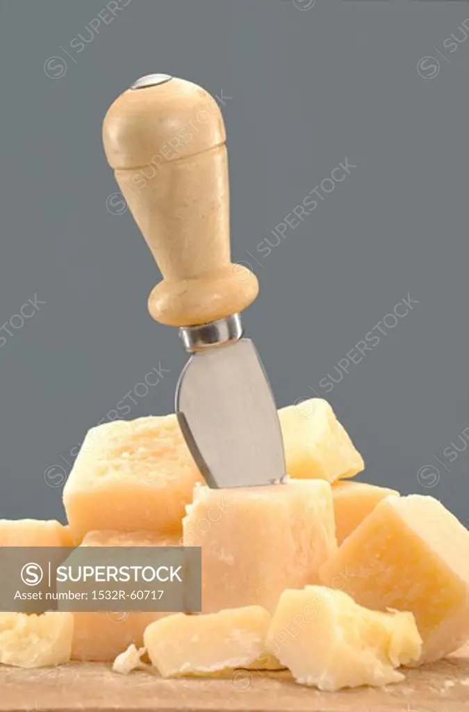Parmesan cubes with cheese knife