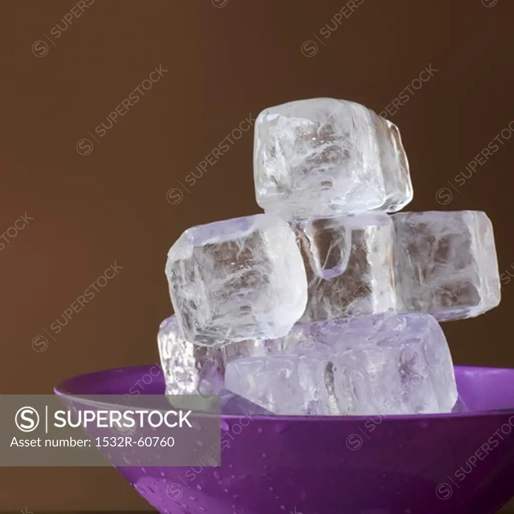 Ice cubes in a lavender colored dish