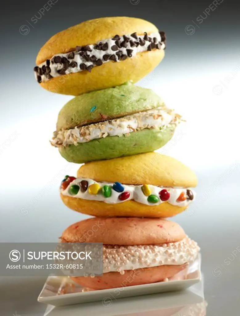 A stack of various whoopie pies