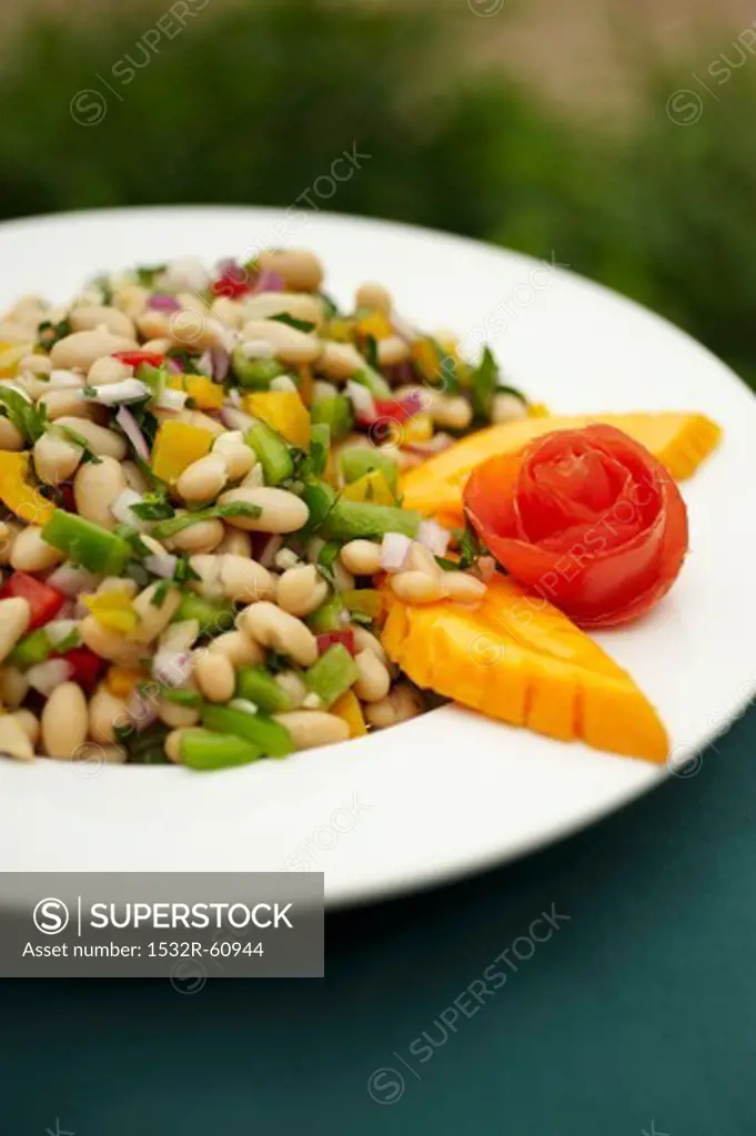 Bowl of White Bean Salad with Papaya Garnish