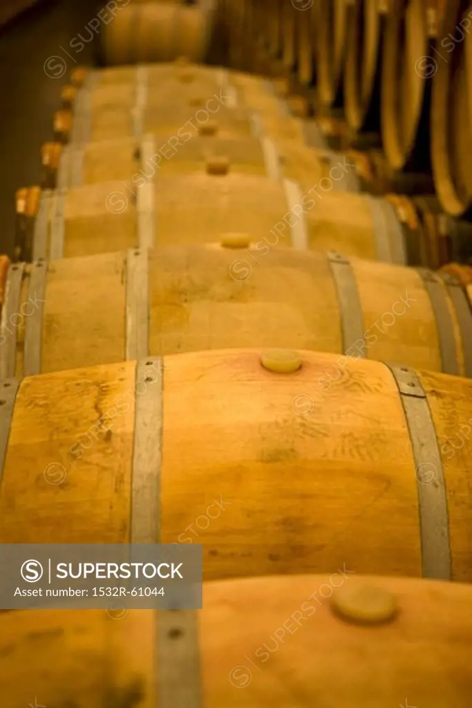Wooden barrels in a wine cellar (Chateau Lynch-Bages, Frankreich)