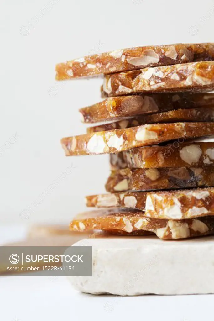 Caramel with Hazelnuts; Stacked on Stone Tile