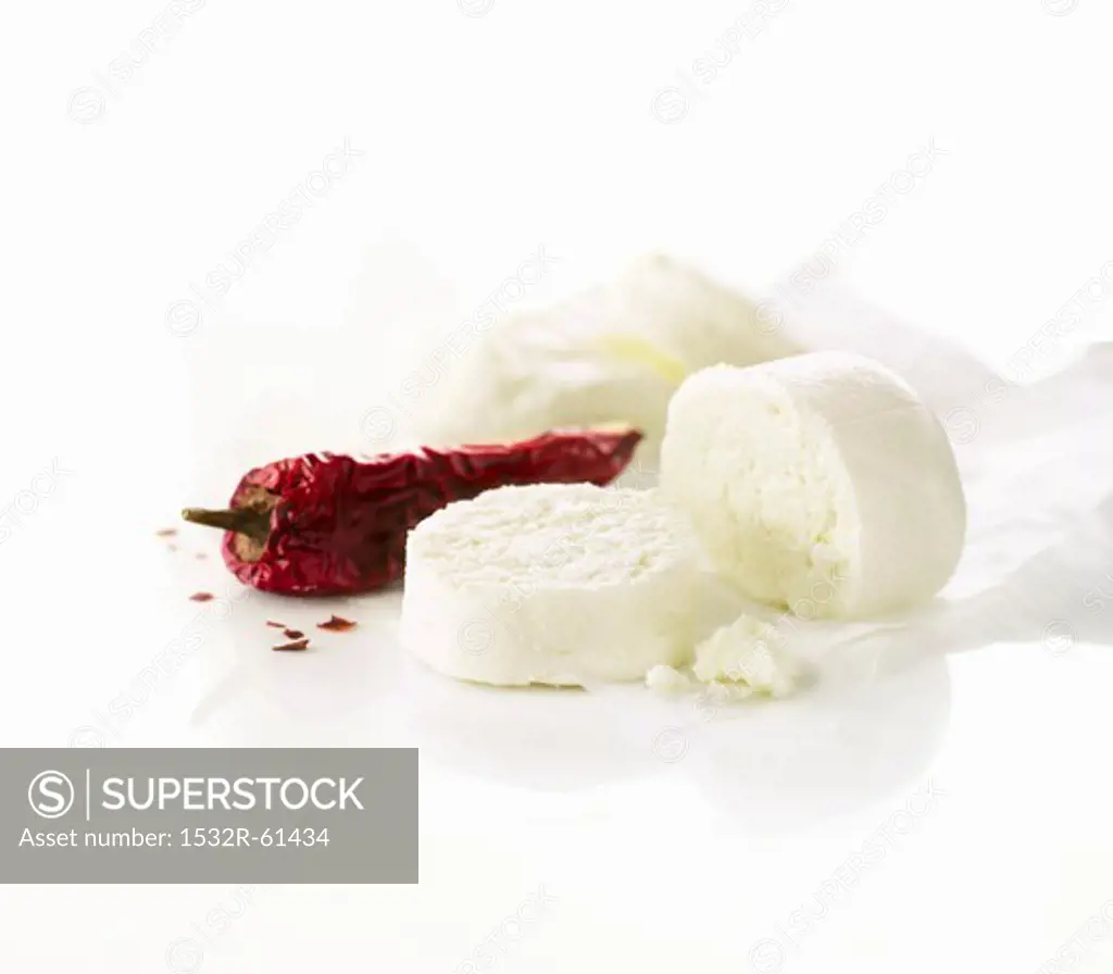 Goat cheese and dried chili peppers