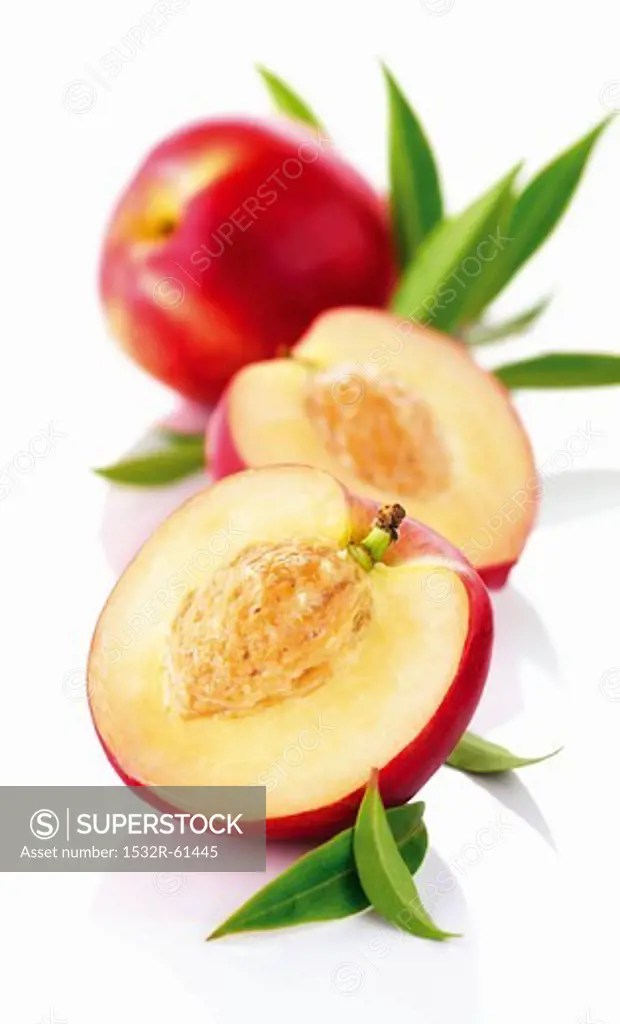 White nectarines with leaves