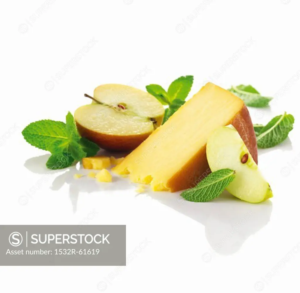 A sliced of smoked cheese and a sliced apple