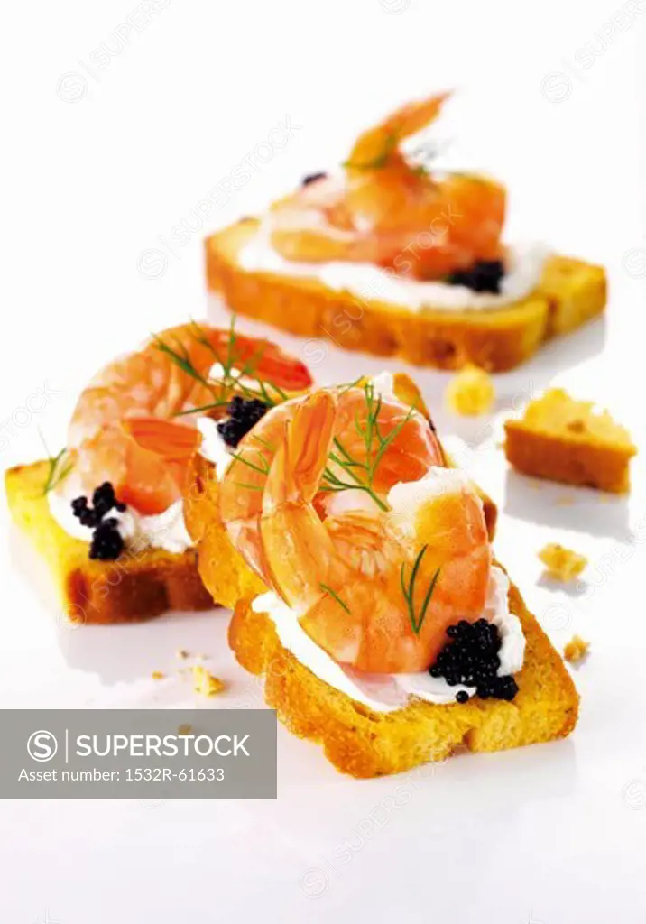 Bruschetta with prawns and caviar