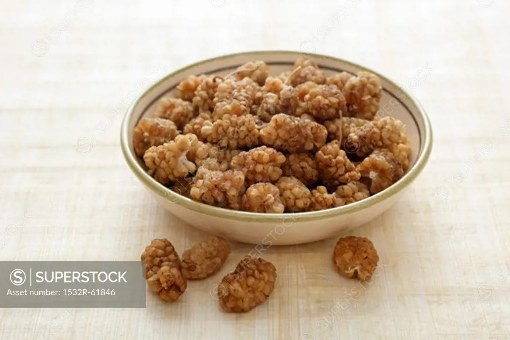 A bowl of dried white mulberries