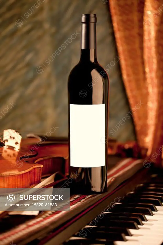 Bottle of Red Wine on a Piano; Violin