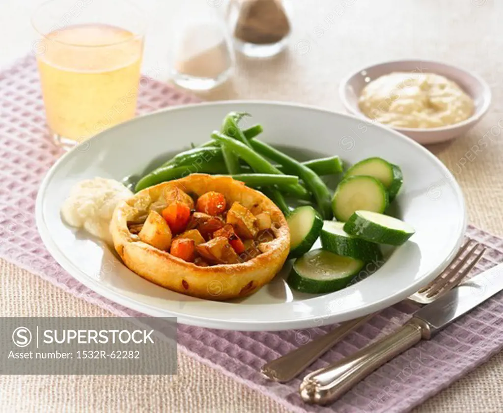 A Yorkshire pudding filled with roasted vegetables