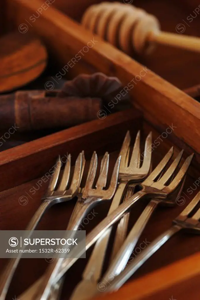 Antique Silver Forks in a Wooden Box