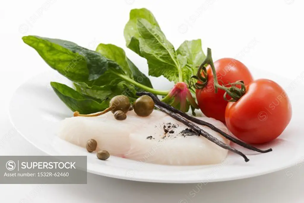 Halibut, spinach, capers, vanilla pods and tomatoes