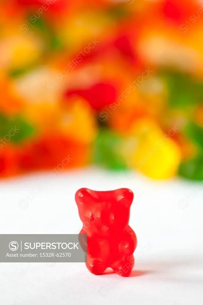 Red Gummie Bear; Many Gummie Bears in Background