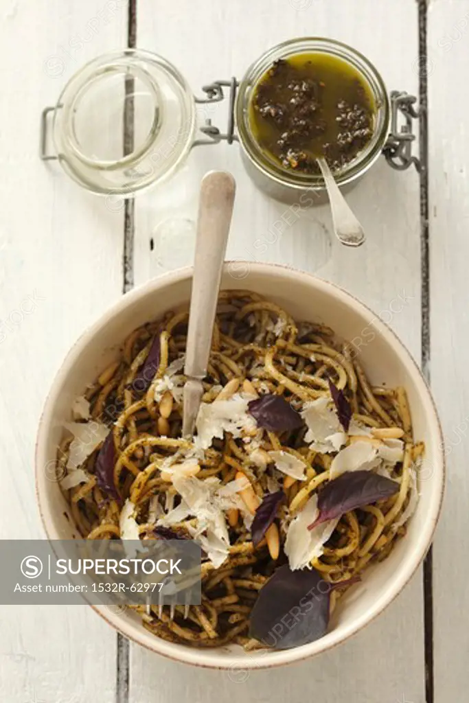 Spaghetti with purple basil pesto and Parmesan cheese