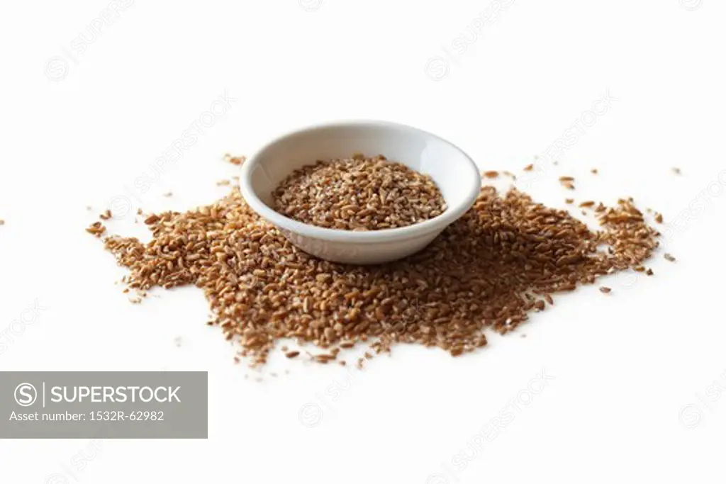 Bulgur wheat, in and around bowl