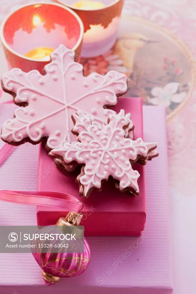 Christmas biscuits decorated with pink icing as a gift