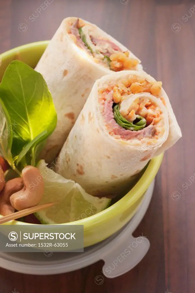Roast beef wraps in a lunch box