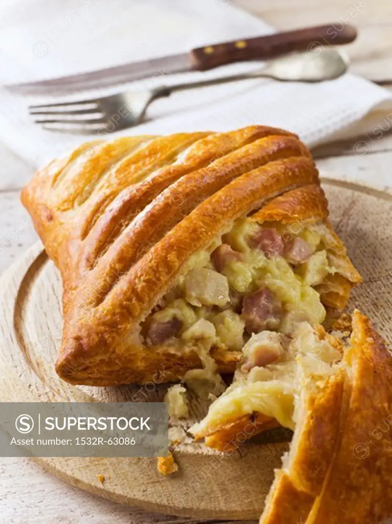 Chicken and ham pasty, cut