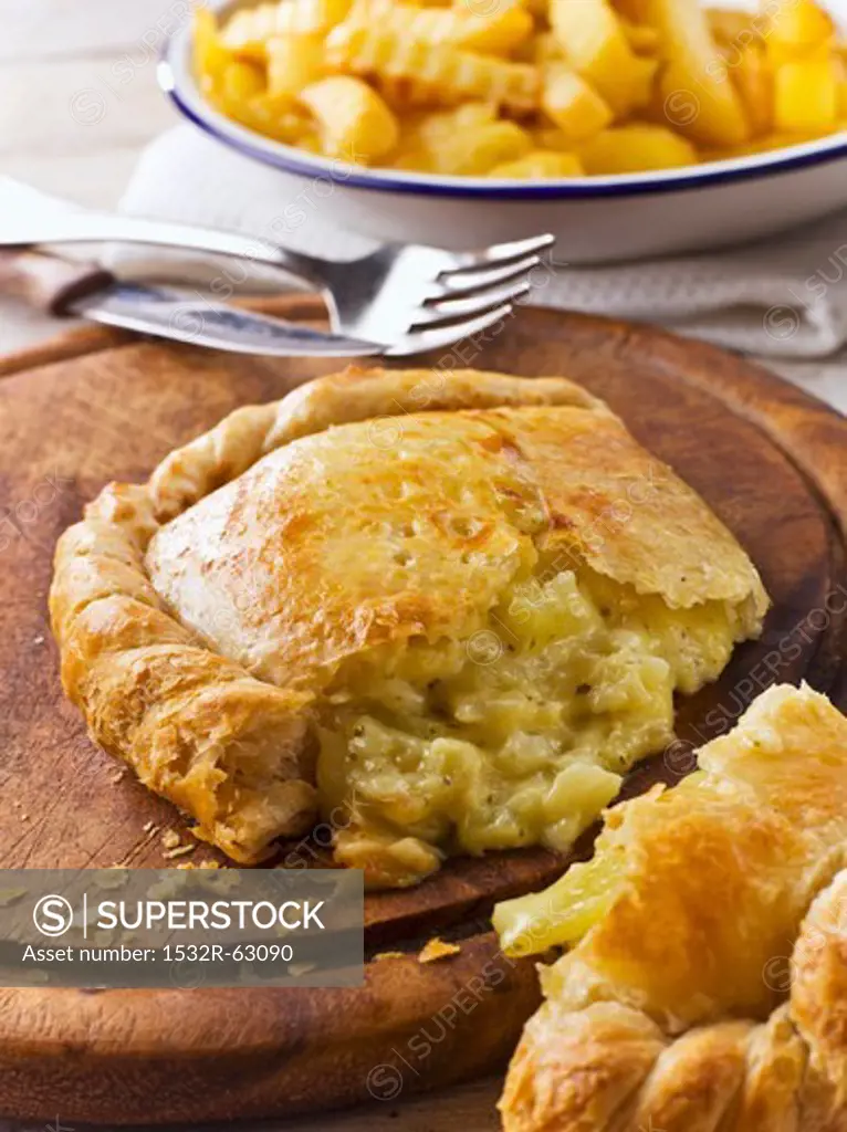 Cheese and onion pasty, cut