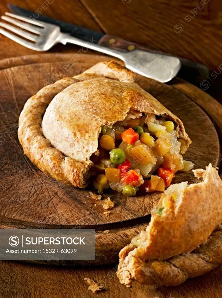 Wholemeal vegetable pasty, cut
