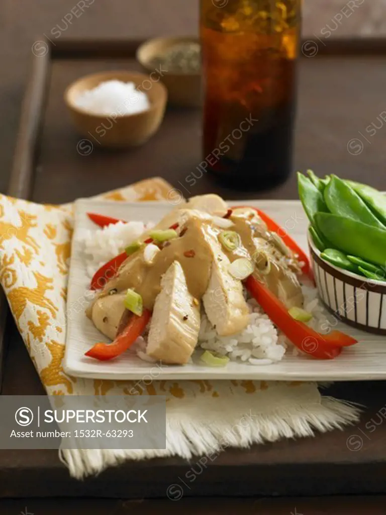 Roast Chicken with Red Bell Peppers Over Rice with Peanut Sauce; Pea Pods