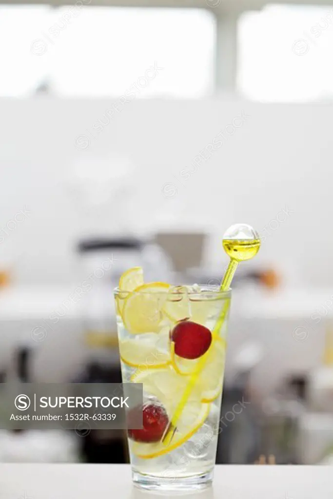 Vodka and lemonade with cherries