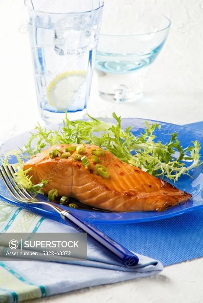 Marinated Salmon with Greens on a Blue Plate