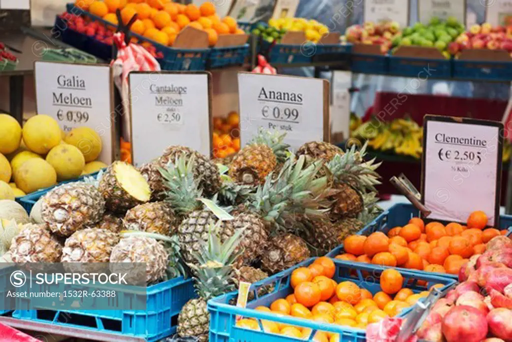Various fruits in crates at market
