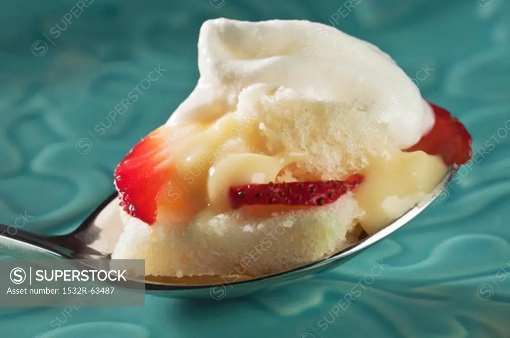 Pound Cake with Pudding Filling, Strawberries and Whipped Cream on a Spoon