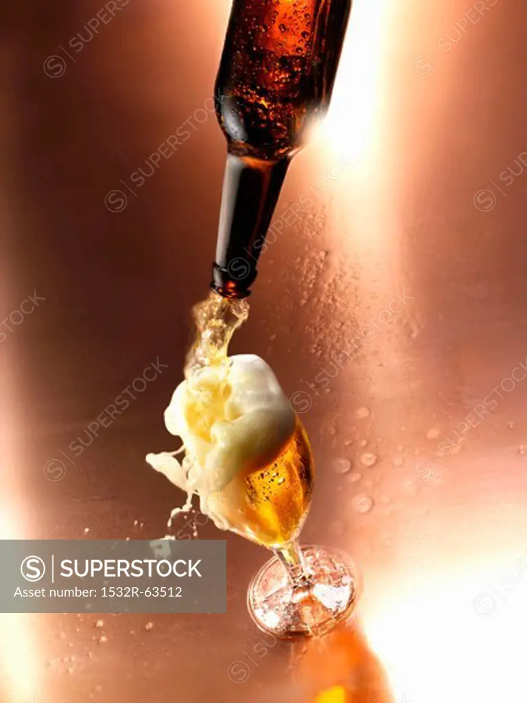 Beer being poured into a glass