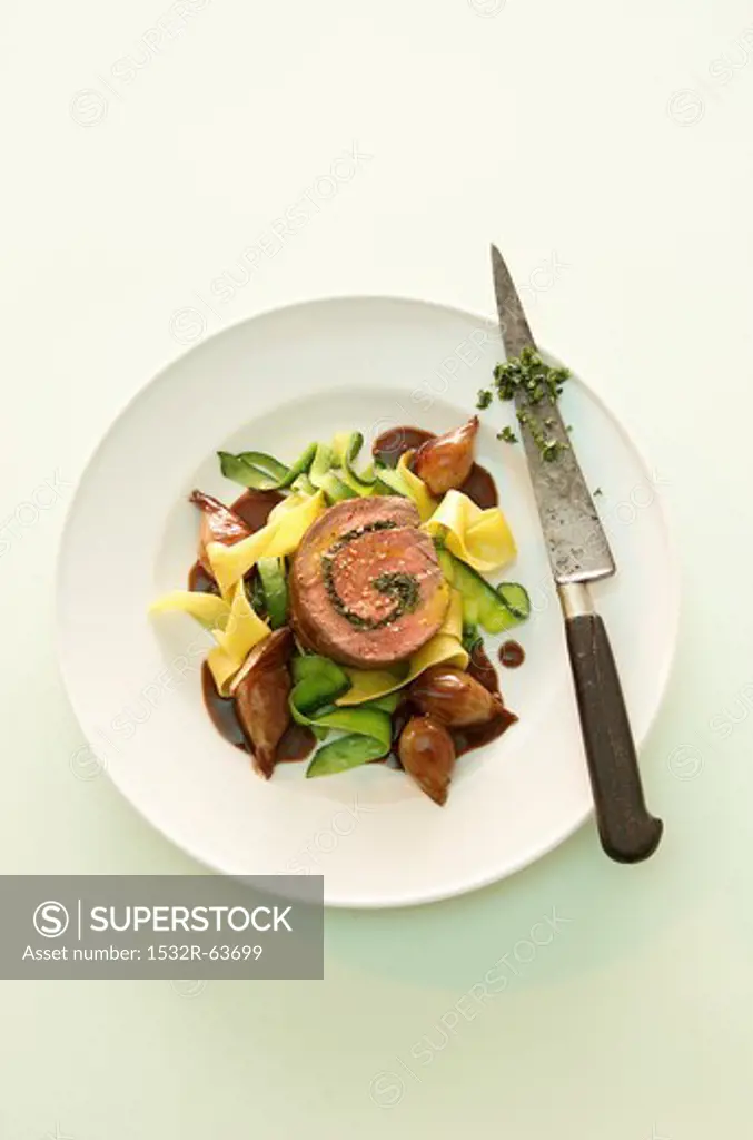 Beef roulade with pasta and vegetables