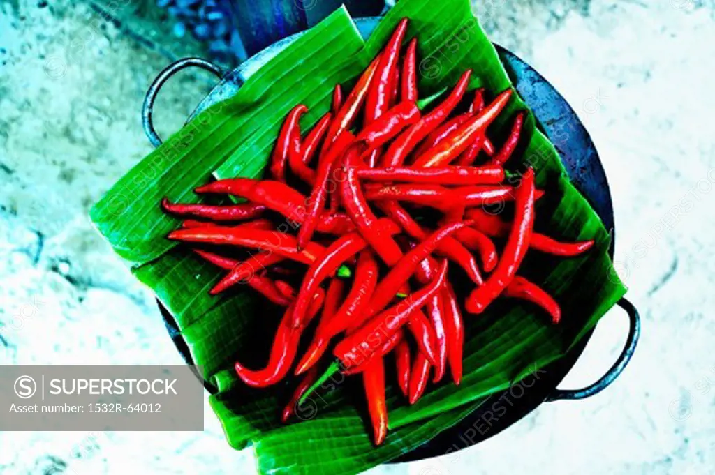 Thai chilli peppers on banana leaves