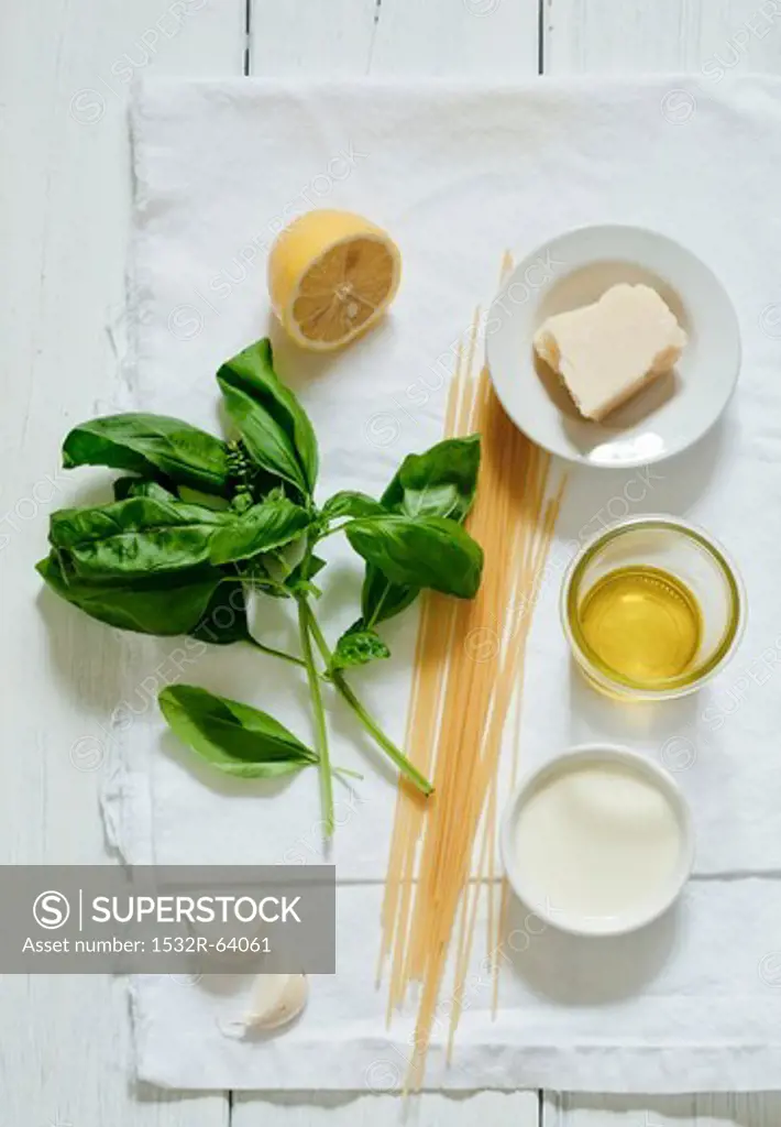Ingredients for spaghetti with cheese and basil