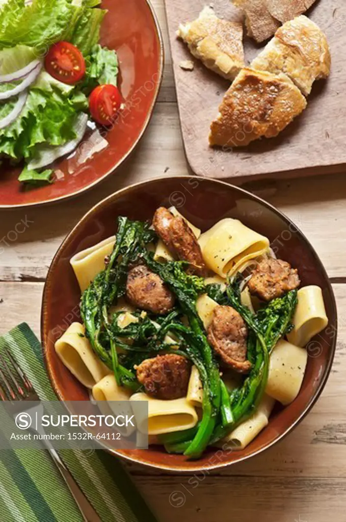 Bowl of Pasta with Broccoli Rabe and Sausage; Salad and Bread