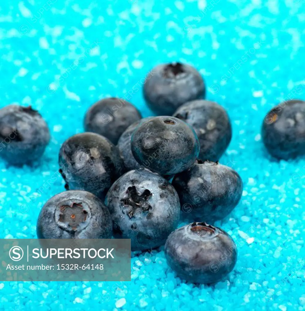 Blueberries on blue gravel