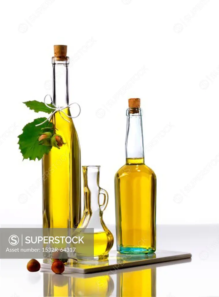 Three bottles of hazel nut oil