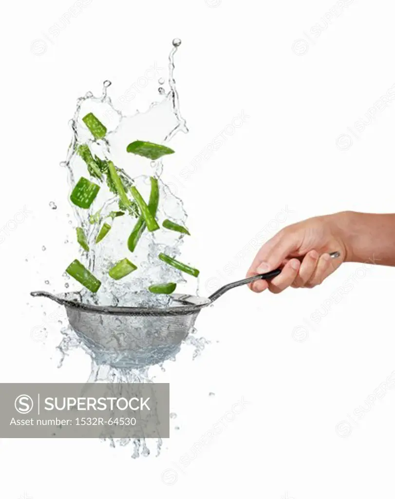 Aloe vera and water in sieve