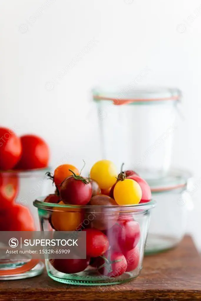 Multi-Colored Cherry Tomatoes in a Glass Container