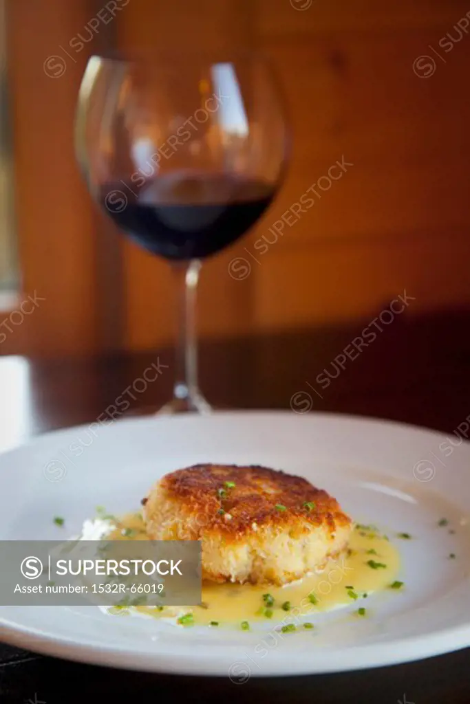 A Crab Cake with a Glass of Red Wine