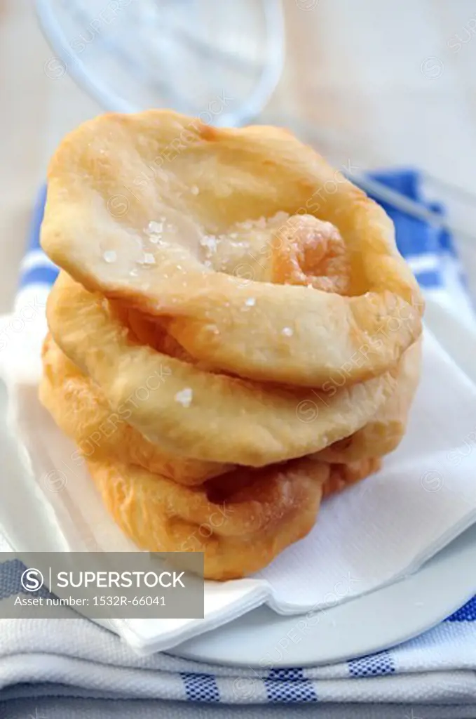 A stack of fried pizza dough