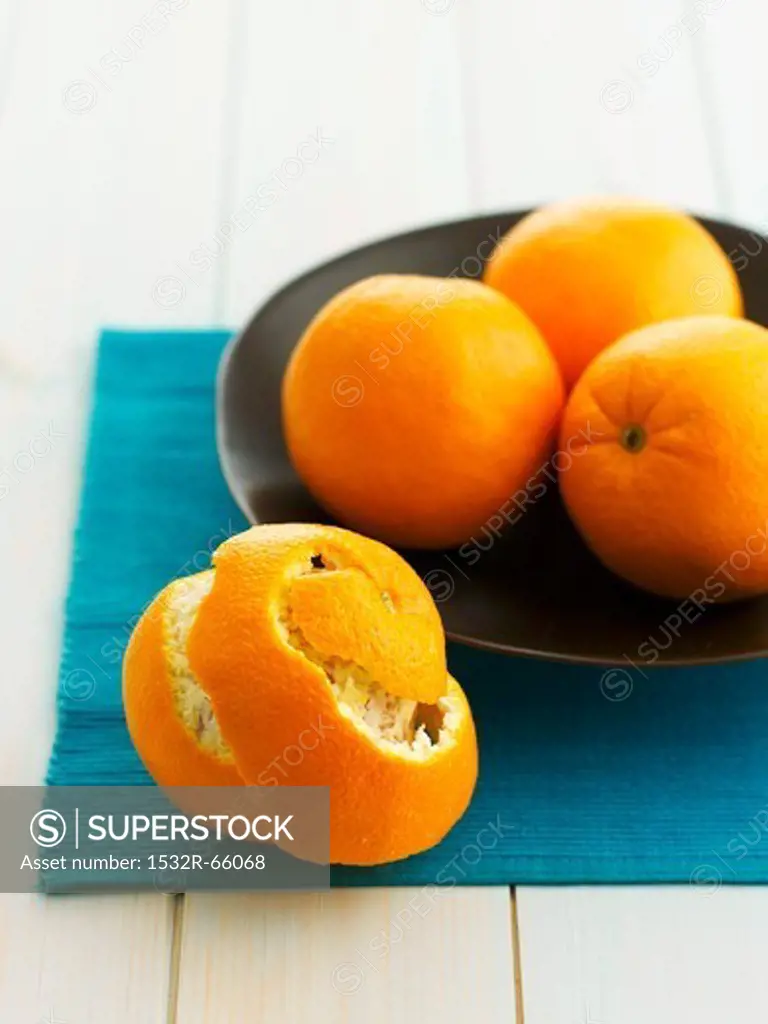 Oranges, whole and peeled