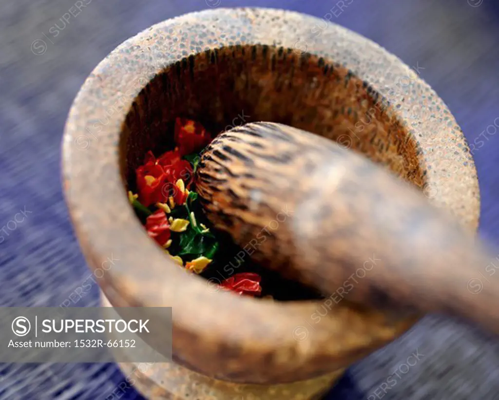 Ingredients for chilli paste in a mortar