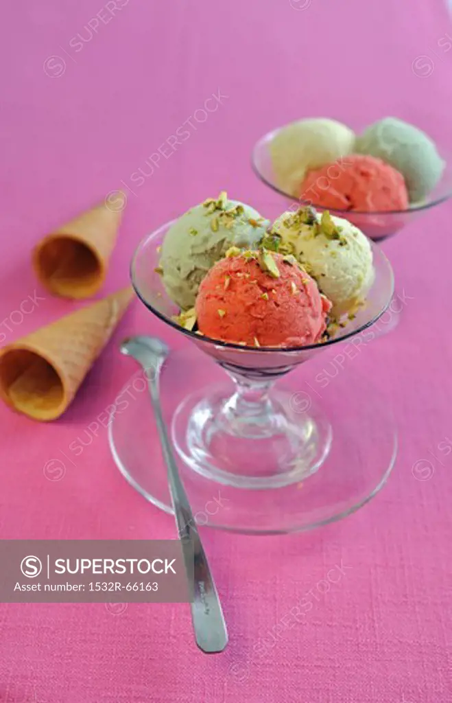 Pistachio and strawberry ice cream with chopped pistachios