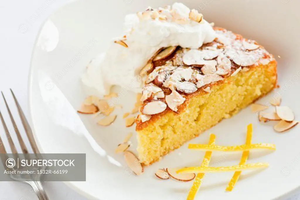 Citrus Olive Oil Cake Topped with Almonds and Whipped Cream
